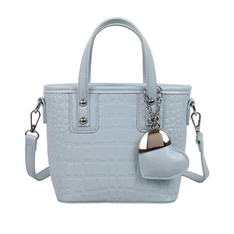 Bolso de alta calidad con textura 2025 verano nuevo estilo bolso de hombro con patrón de cocodrilo moda amor bolso de mensajero mujer