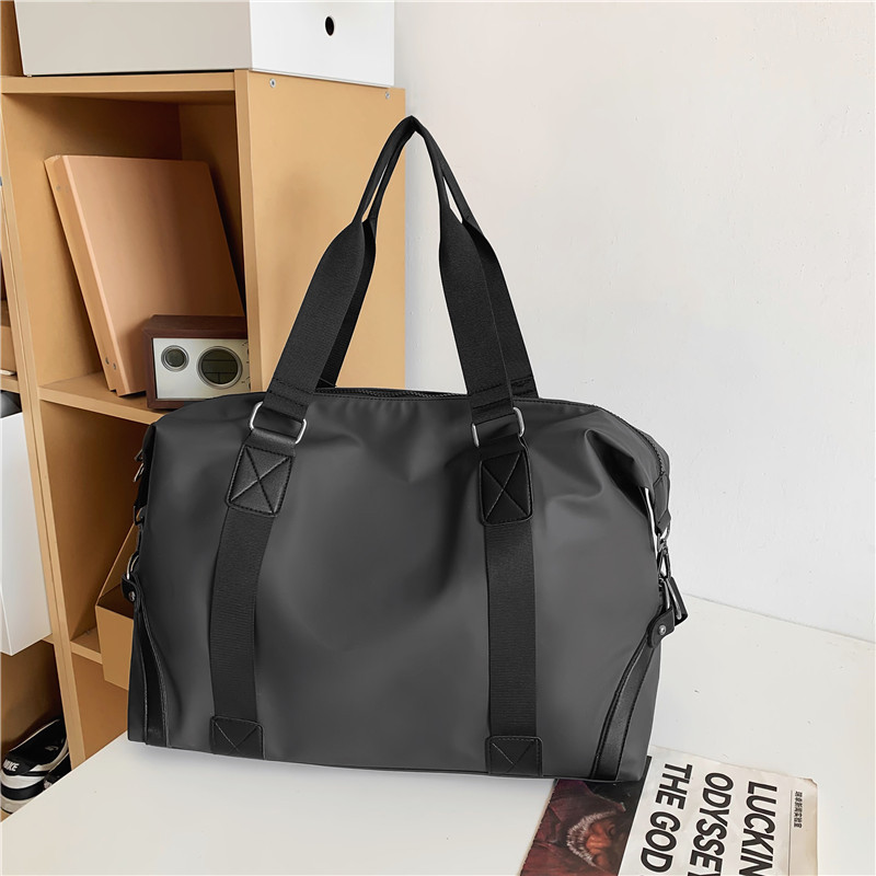 Nuevo bolso de viaje de color sólido, bolso de yoga de mano de gran capacidad, bolso de ocio, bolso de ejercicio, bolso de viaje corto.