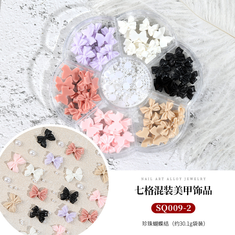 Seven-grid mixed Camellia nail jewelry bow flat diamond lollipop nail pequeña bola de acero Pearl Square Diamond
