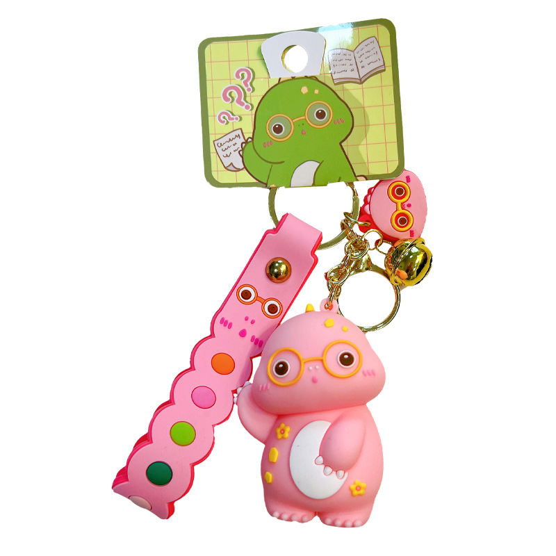 Keychain dinosaurio auténtico lindo bolso colgante de goma blanda llavero de automóvil muñeca pequeña máquina de regalos al por mayor image 5
