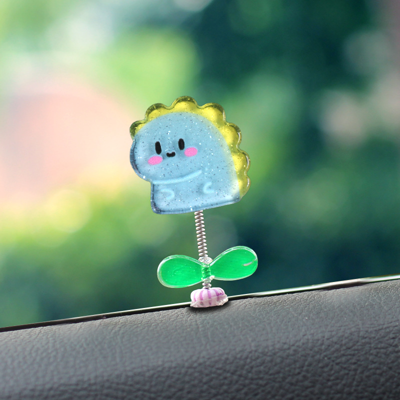 Adornos pequeños de dibujos animados lindos, decoraciones interiores de automóviles, adornos de automóviles, autos eléctricos, muñecas que sacuden la cabeza, descompresión de escritorio, celebridades de Internet
