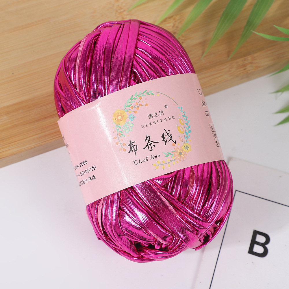 Línea textil Qian Zhi hilo de color mágico tejido a mano hilo de fantasía de color bricolaje en stock fábrica al por mayor