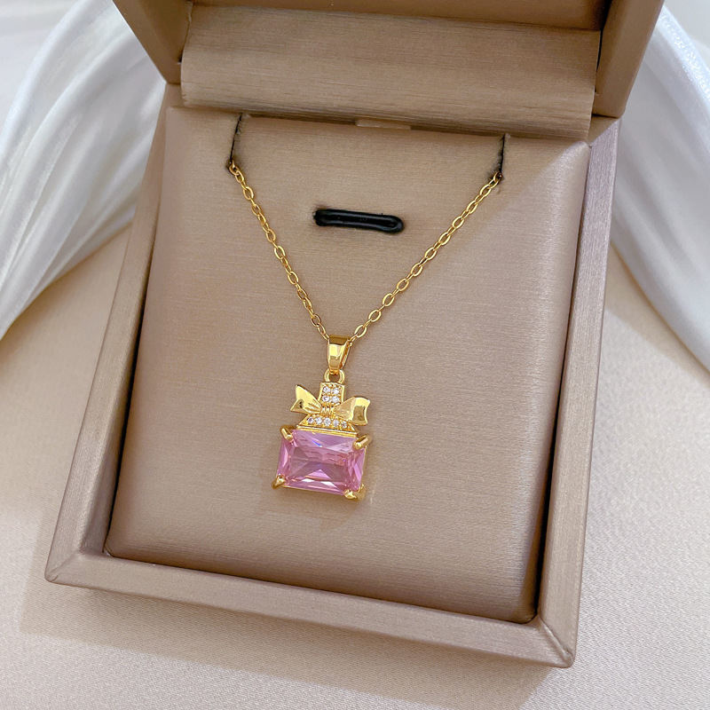 Set collana e orecchini a farfalla con boccetta di profumo_voghion.com