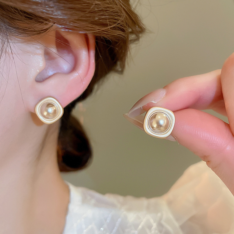 Aguja de plata, perla, circón, borla, pendientes de moda, lujo ligero, pendientes de alta gama, pendientes de todo fósforo exquisitos de nicho, mujeres al por mayor