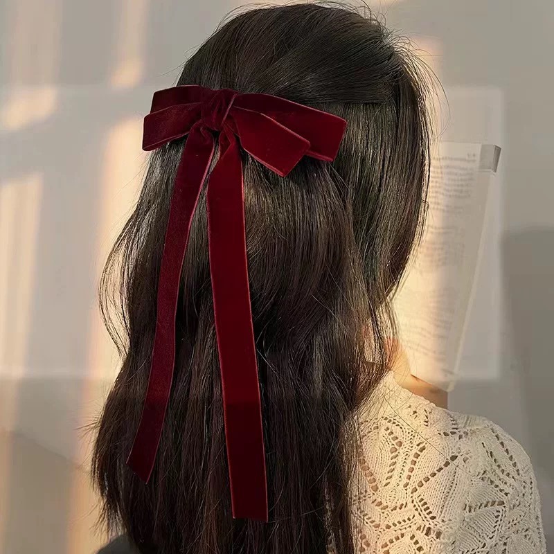 Burgundy hair accessory for bride