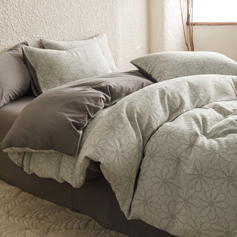 Clase ligera de lujo A algodón lavado de algodón de cuatro piezas de tres capas de hilo jacquard edredón cubierta sábana de algodón de fibra larga cama de algodón de cuatro piezas