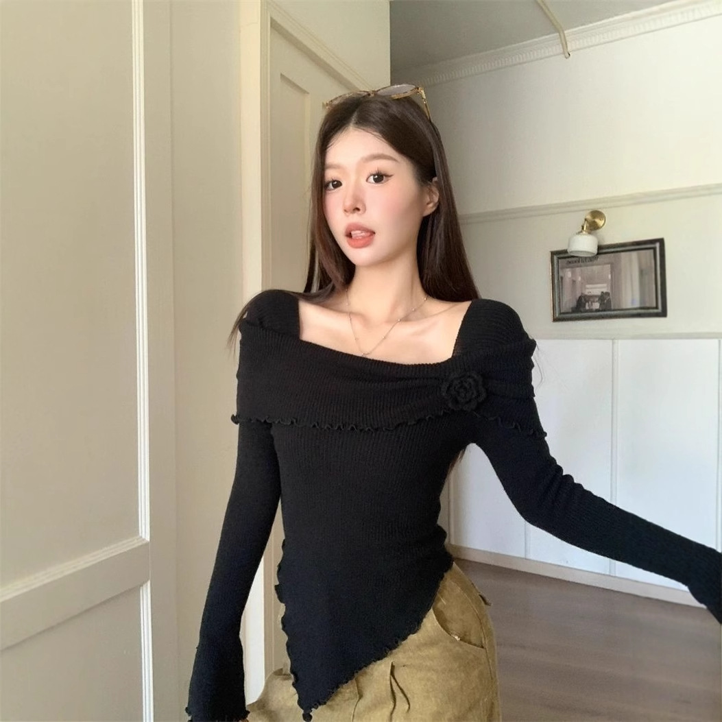 フランス風の気質の木の耳元の立体的な花の一字の肩のニットの上着の修身のセーターの底のシャツの女性は秋冬を掛けます。