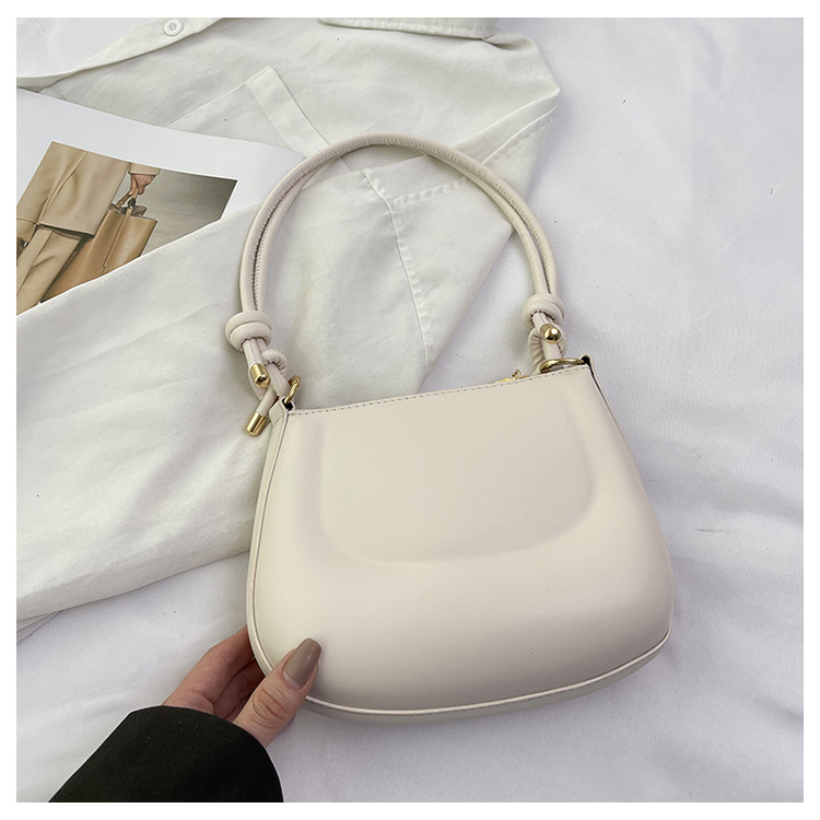 Textura color caramelo nuevo bolso femenino portátil moda moda bolso de hombro estilo occidental bolso de axila simple bolso de silla dulce