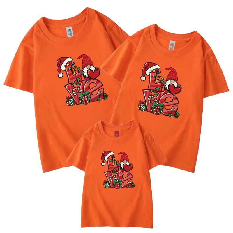 Comercio electrónico transfronterizo Traje de padre-hijo de regalo de Navidad europeo y americano nueva familia de tres camiseta madre-hijo manga corta sombrero de Navidad