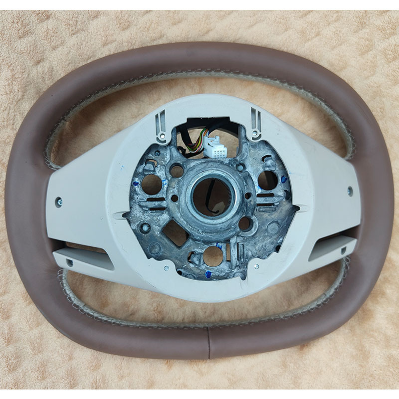Compatible with Chery iCAR V23 steering wheel assembly 404AA1, featuring a two-tone genuine leather design and multi-functional buttons. Quality guaranteed