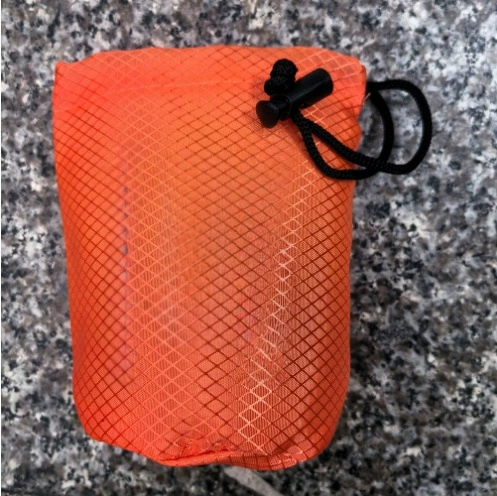Raincoat, whistle, orange bag