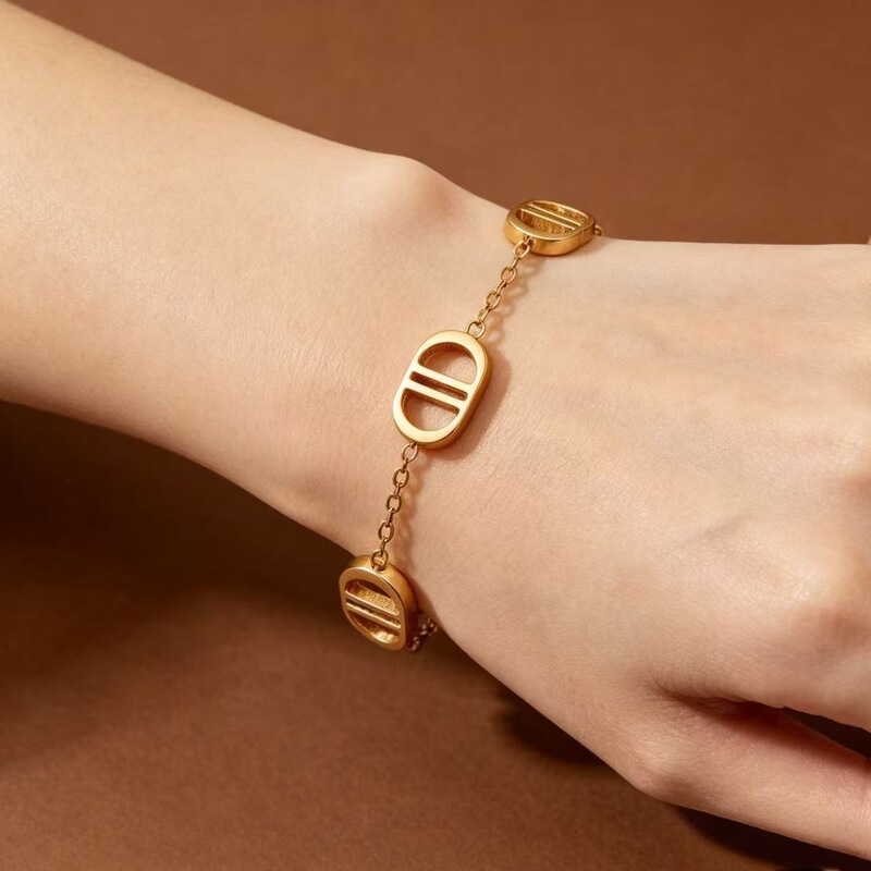 Double D Letter Hollow Chain Bracelet, Minimalist Titanium Steel Wrist Accessory for Women, Niche Design, Factory Wholesale Double D Letter Hollow Chain Bracelet, Minimalist Titanium Steel Wrist Accessory for Women, Niche Design, Factory Wholesale