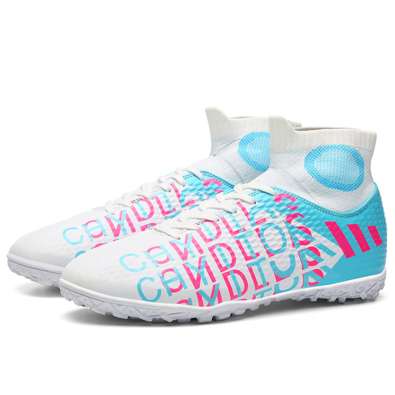 Zapatos de fútbol al por mayor para hombres y mujeres transpirables casuales color de alta calidad edición de clavos casuales zapatos de entrenamiento de césped para niños