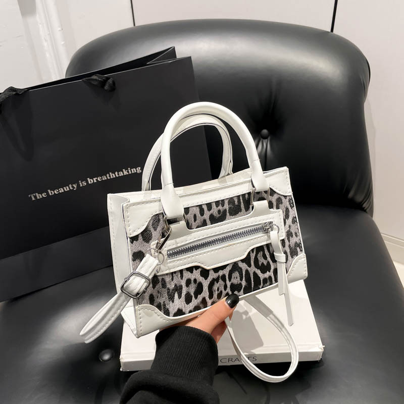 Bolso de hombro exterior simple textura casual primavera 2025 nueva moda coreana estampado leopardo bolso de mochila cuadrado