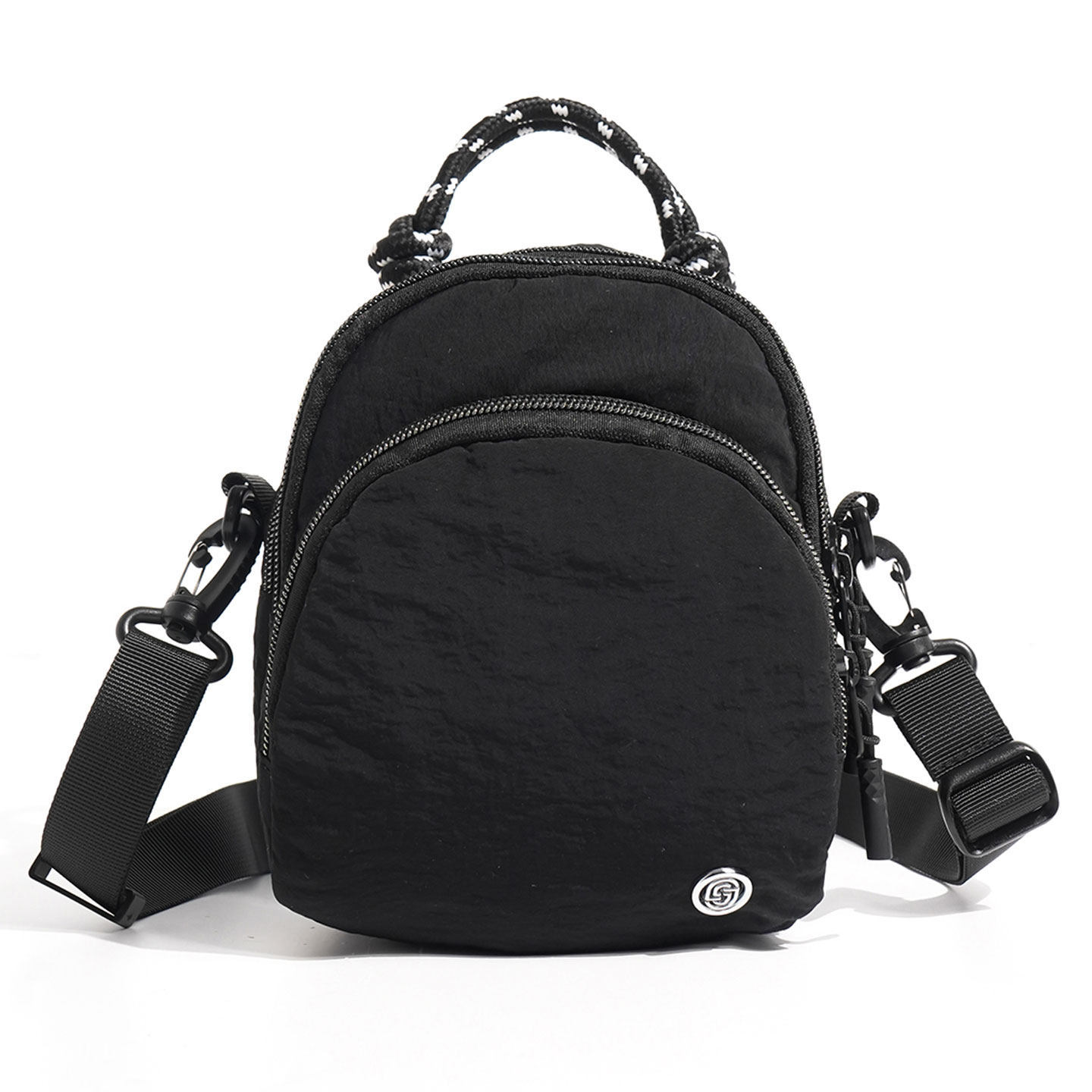 Simple mochila ligera nueva moda 2026 bolsos al aire libre nicho de hombro con el mismo teléfono móvil de nylon para hombres y mujeres