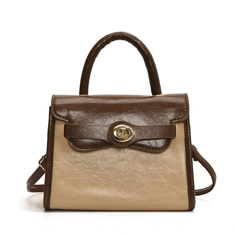 Moda 2025 primavera y verano nueva versión coreana de la retro Kelly bolso femenino 100 bolsos de hombro, nicho, bolso casual simple