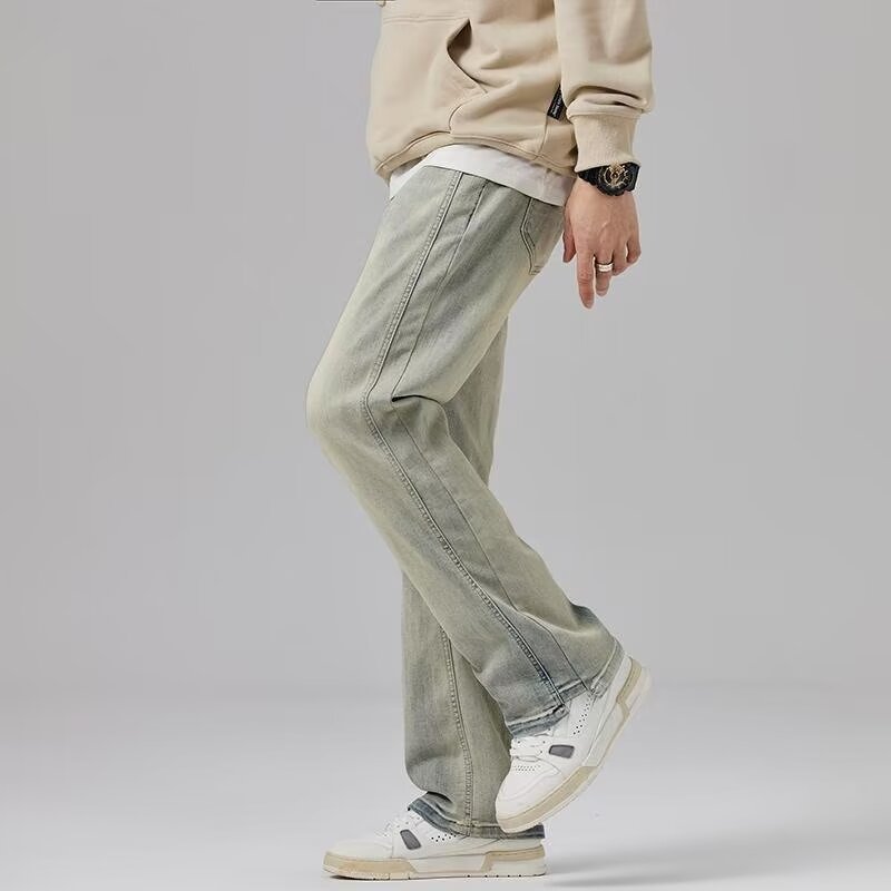 Vaqueros teñidos de barro amarillo de marca de moda retro para hombres lavados y viejos pantalones micro-lat de calle alta americana 2024