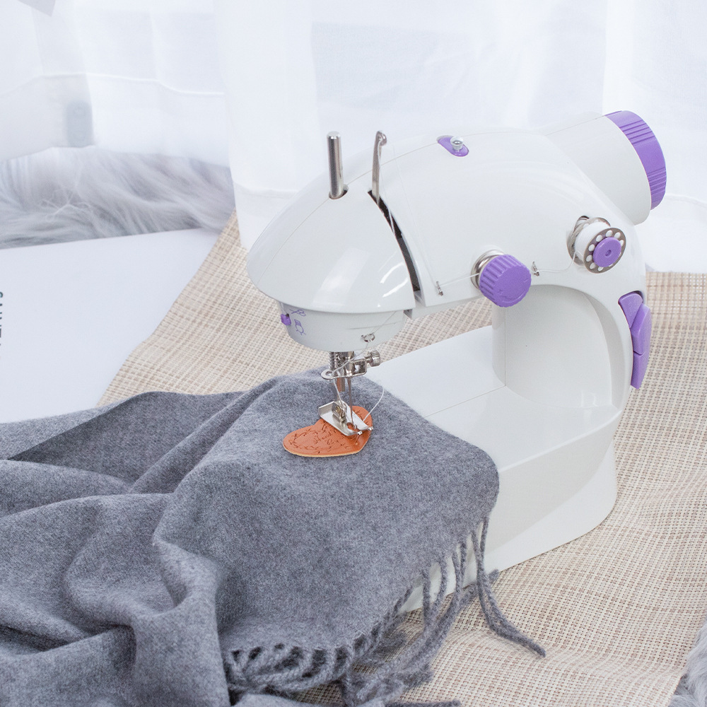 Exportación de comercio exterior 201 máquina de coser eléctrica doméstica máquina de coser multifuncional máquina de coser micro de escritorio con luz