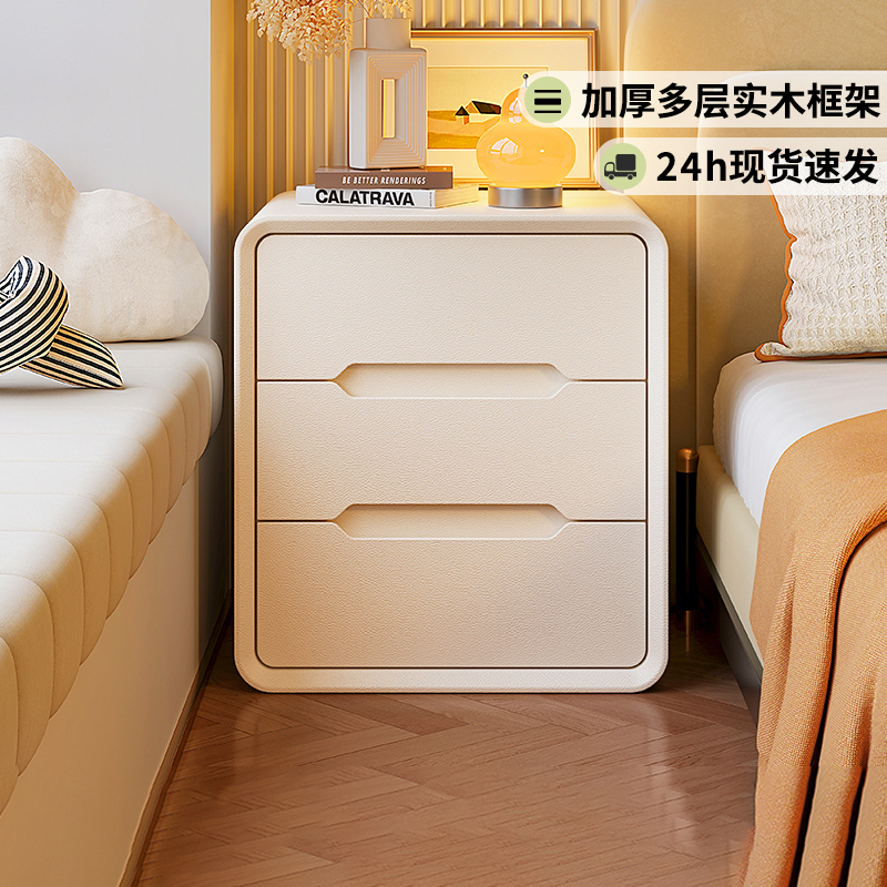 Mesa de cabezal de cama de madera maciza dormitorio doméstico 2025 nuevo estilo de cama pequeño viento de crema de lujo ligero alta sensación gabinete de almacenamiento