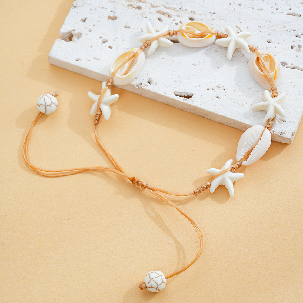 Europa y América playa viento marino tejido a mano pulsera conchas de estrellas de mar nicho simple estilo versátil personalidad