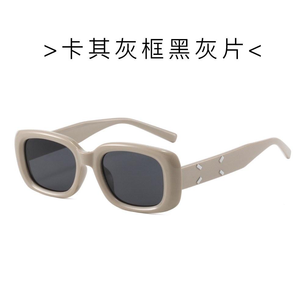 Xiaohongshu mismo estilo personalidad gafas de sol de montura pequeña gafas de sol de moda hip-hop nuevo color caramelo street shooting versión coreana al por mayor