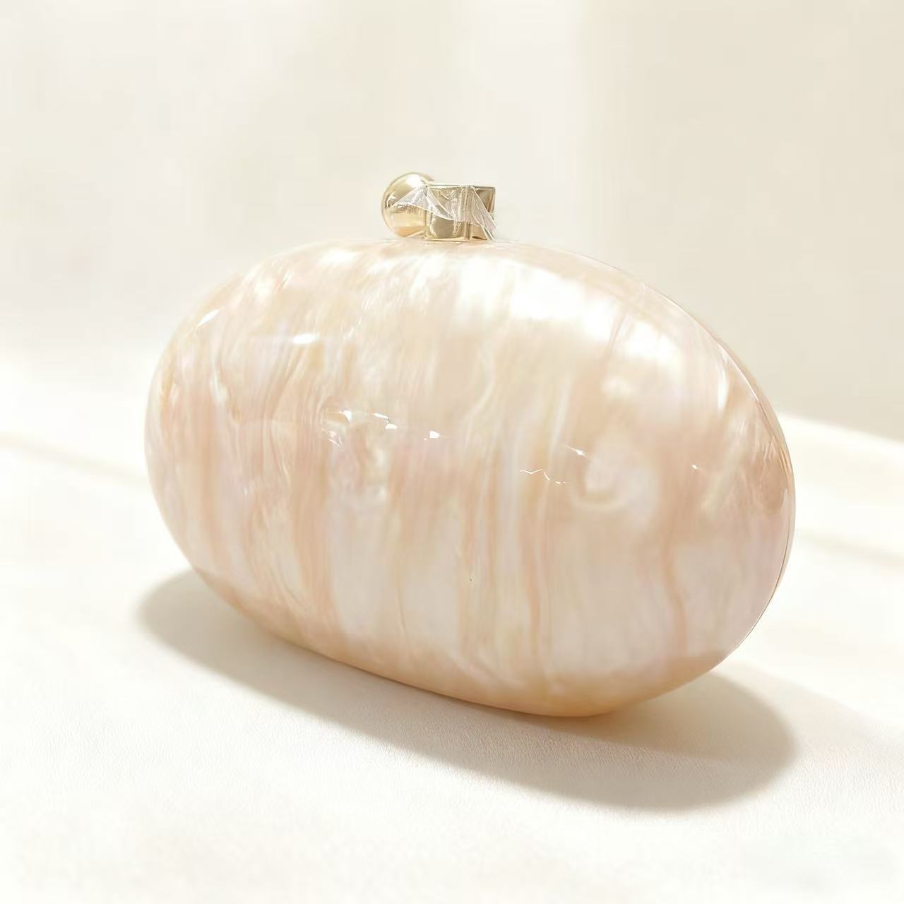 Bolsa de cena de lujo ligera transfronteriza, café de perla de almendro, bolsa de mano acrílica ovalada, bolsa de noche de hombro para damas