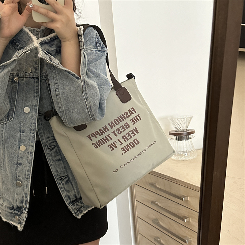 Bolsa de viaje de gran capacidad para mujeres 2022 nueva bolsa de lona de hombro, bolso de la universidad, bolsa de clase.