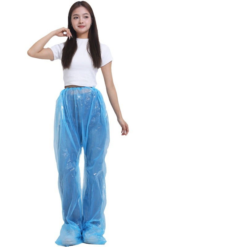 Pantalones de lluvia desechables engrosados y empaquetados a prueba de agua a la deriva Pantalones de lluvia portátiles divididos transparentes unisex