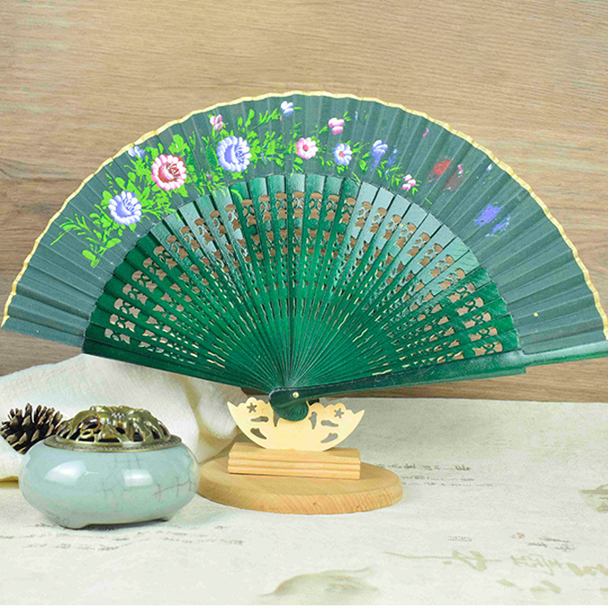 Exquisita tela de seda de borde estampado de alta calidad pintada a mano ventilador de madera español ventilador de regalo hueco ventilador de madera brillante