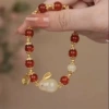 S33 red bead rabbit bracelet