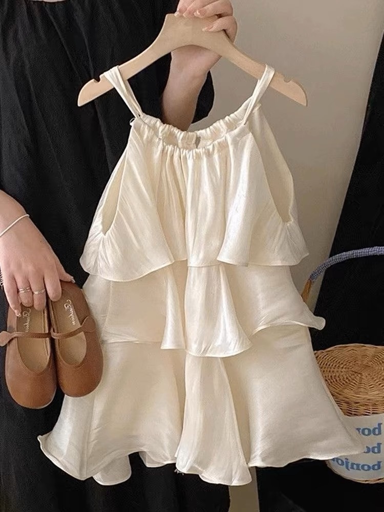 Xianning siete ropa para niños 25 verano nuevo vestido de temperamento dulce para niñas falda de tirantes de pastel con volantes de alta gama