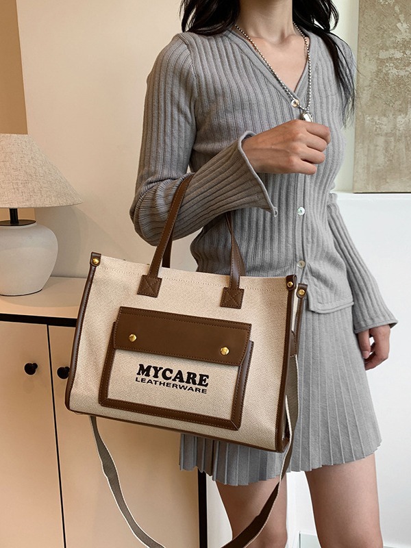 Bolso de hombro retro de tela con colores contrastantes para mujer, nuevo bolso cruzado de gran capacidad para el día a día, ideal para comercio transfronterizo.