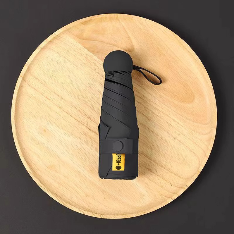 50% de descuento sol y lluvia paraguas de protección solar paraguas de sol UV portátil compacta cápsula sombrilla personalizada