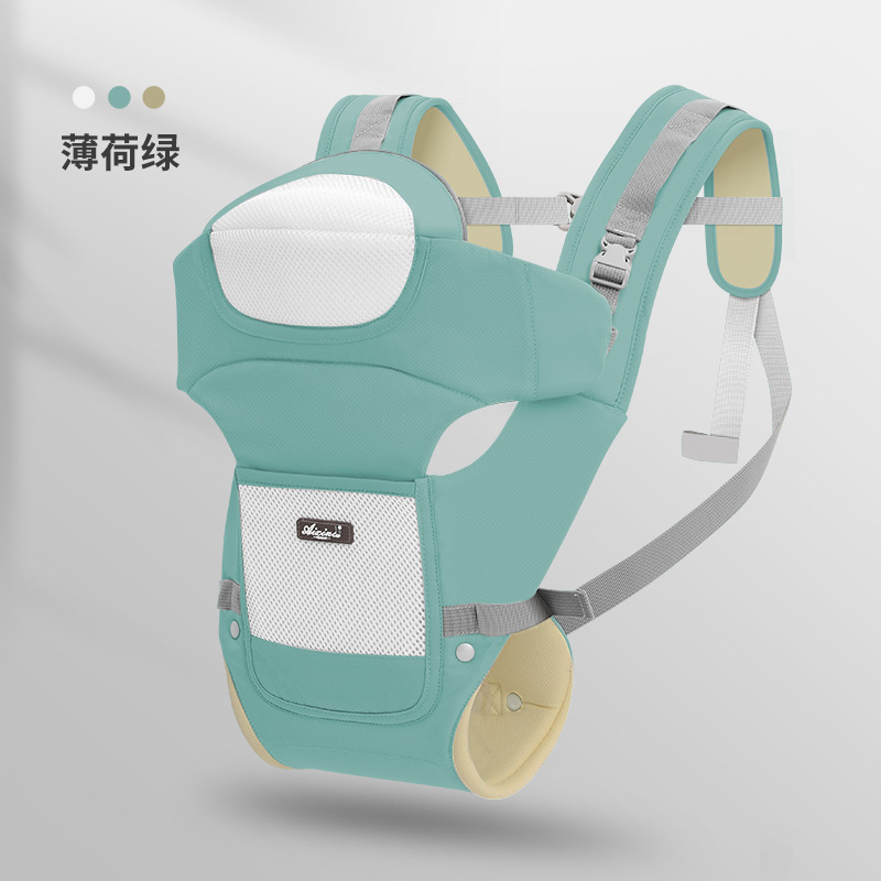 工場の現物の赤ちゃんの腰の腰掛けの赤ちゃんの背もたれの四季の多機能の通用する子供の神器を抱いています。