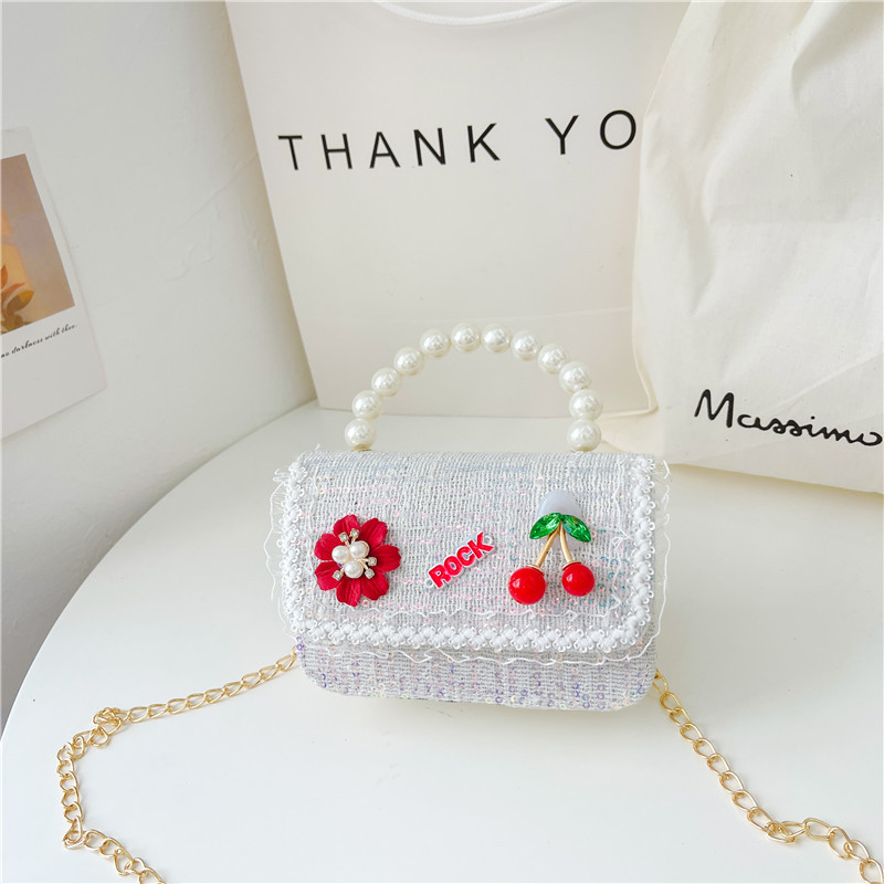 Nuevo bolso de los niños al por mayor Chunxi nuevo arco accesorios bolsa niña fuera monedero crossbody bolsa