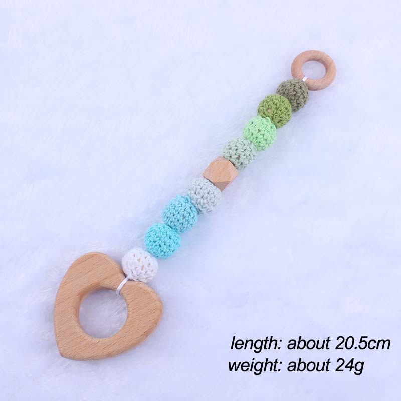 Nueva historieta del bebé haya amor mordedor juguete DIY macaron gran bola de lana mordedura pulsera