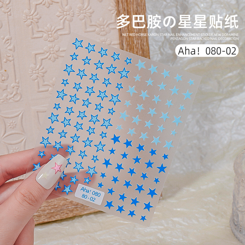 Online rojo macaron estrella uñas pegatinas 2023 nueva dopamina cinco puntas estrella adhesivo decoración de uñas al por mayor