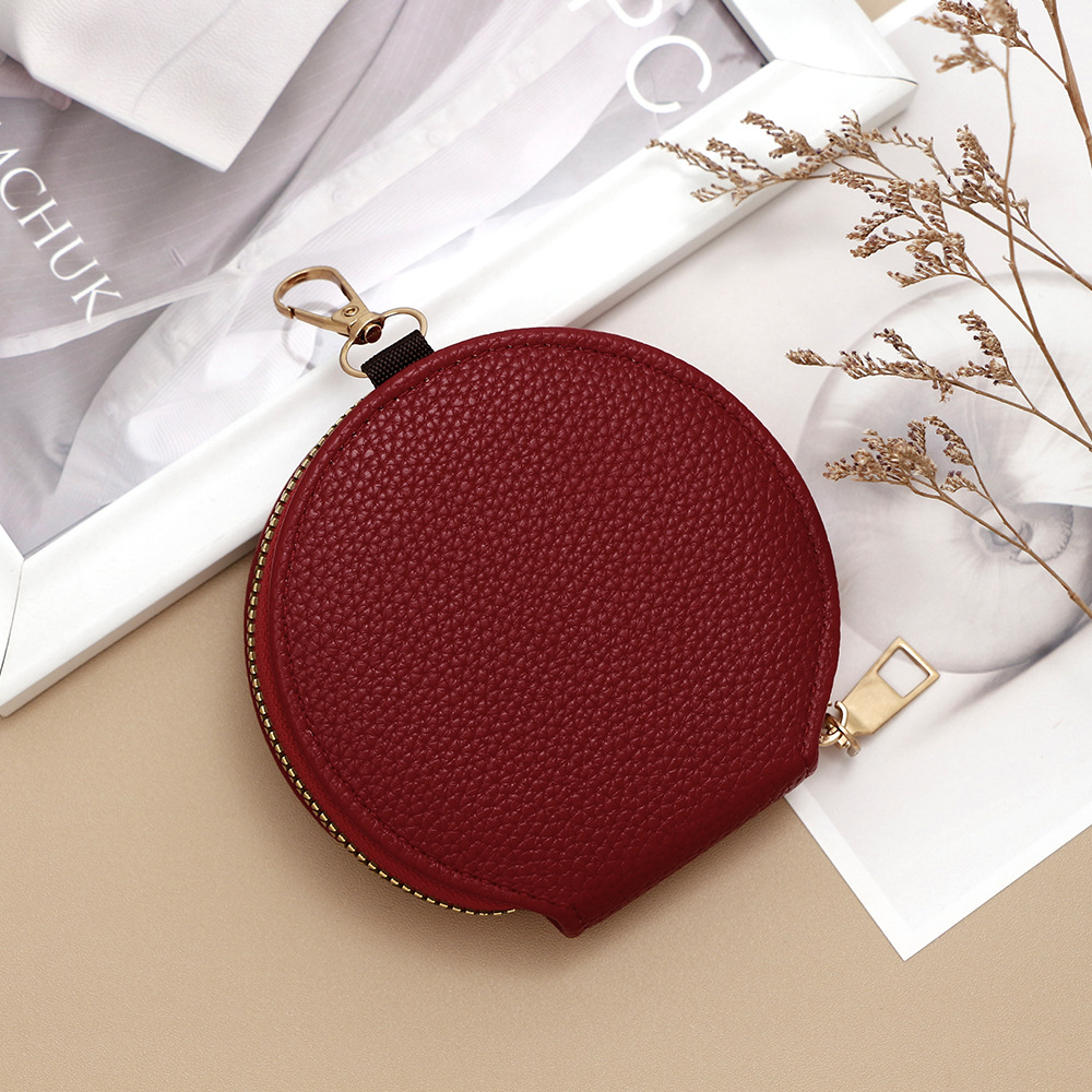 Nuevo Japón y Corea del Sur pequeñas mujeres frescas con cremallera bolso de cambio litchi portátil mini bolso de auriculares redondo llave de almacenamiento