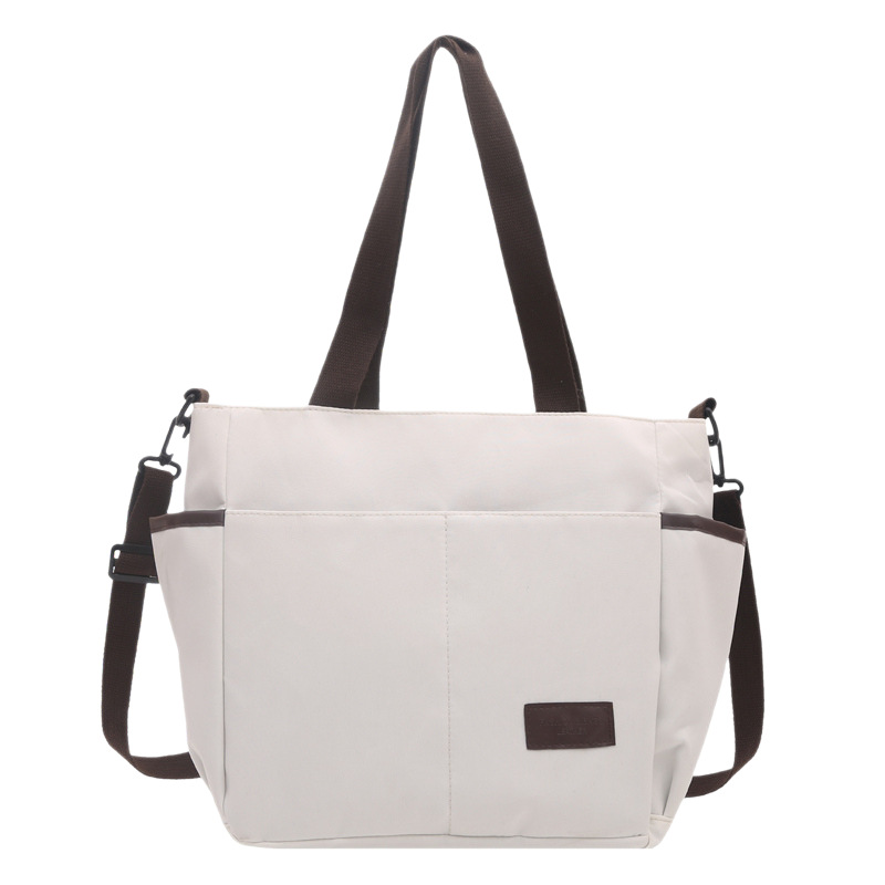 Bolso de lona coreano para mujeres nueva moda ocio de gran capacidad mochila portátil tote simple bolso de hombro para estudiantes