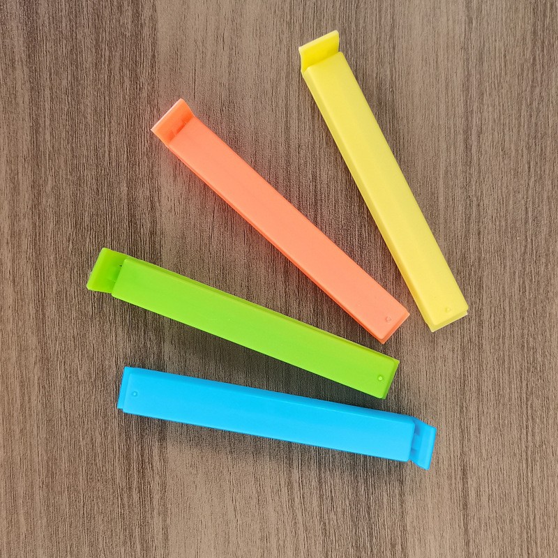 Clips de sellado de alimentos del fabricante, clips a prueba de humedad y para mantener la frescura para té, leche en polvo, refrigerios, bolsas de alimentos, clips de sellado de plástico con logotipo personalizado.