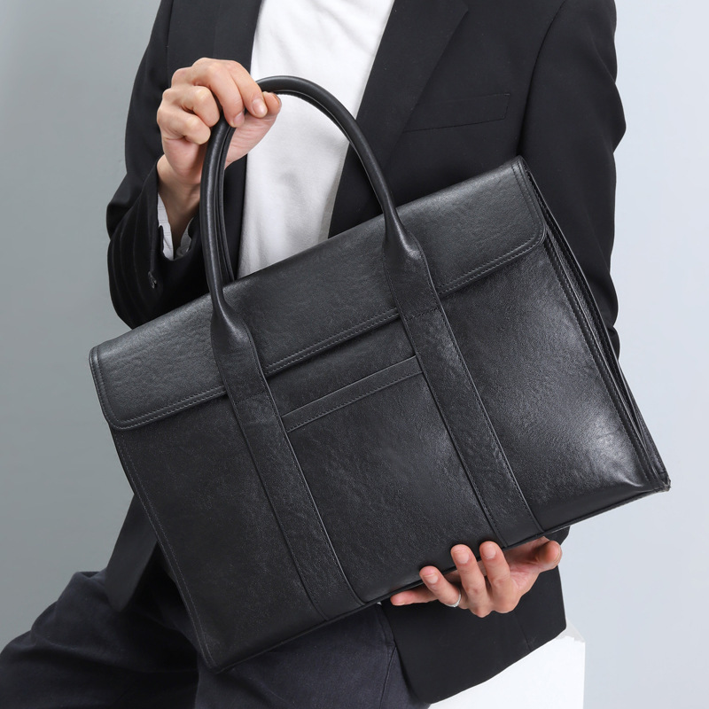 Genuine Leather Handbag Men's High-end Sense High-end Casual Fashion Large Capacity Business Computer Bag Cowhide Men's Briefcase Genuine Leather Handbag Men's High-end Sense High-end Casual Fashion Large Capacity Business Computer Bag Cowhide Men's Briefcase