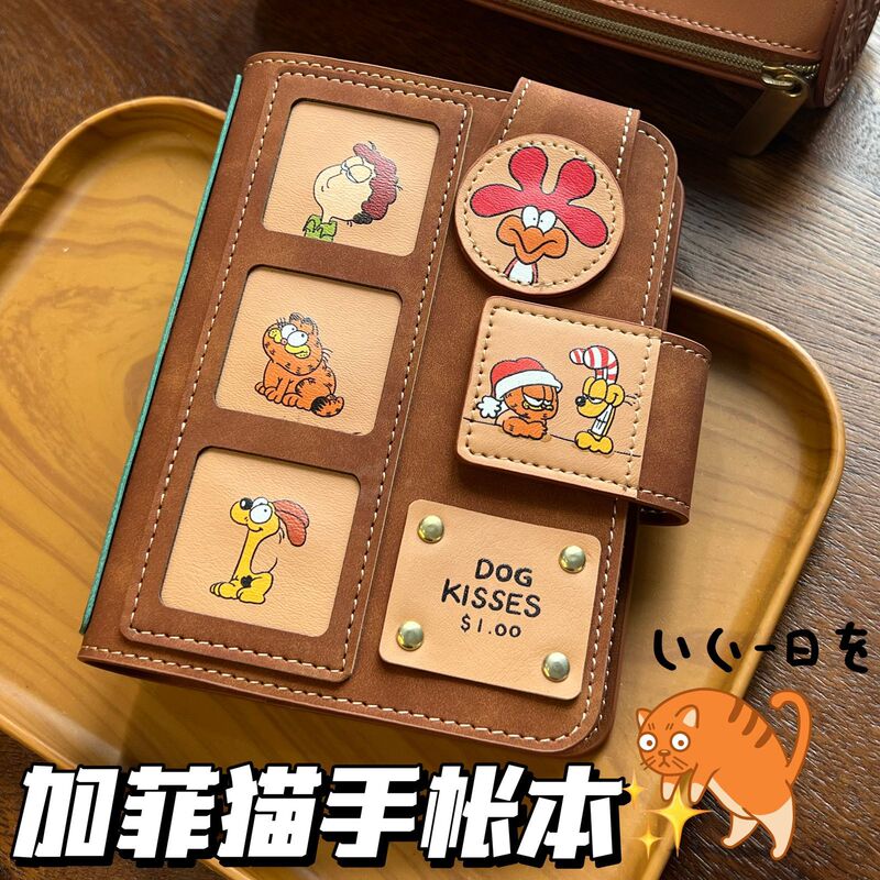 小紅の本の同項のスヌーピーm 5手の帳簿はページの本のinsの風の高い顔の値の皮の日記のノートを取り外します。|undefined