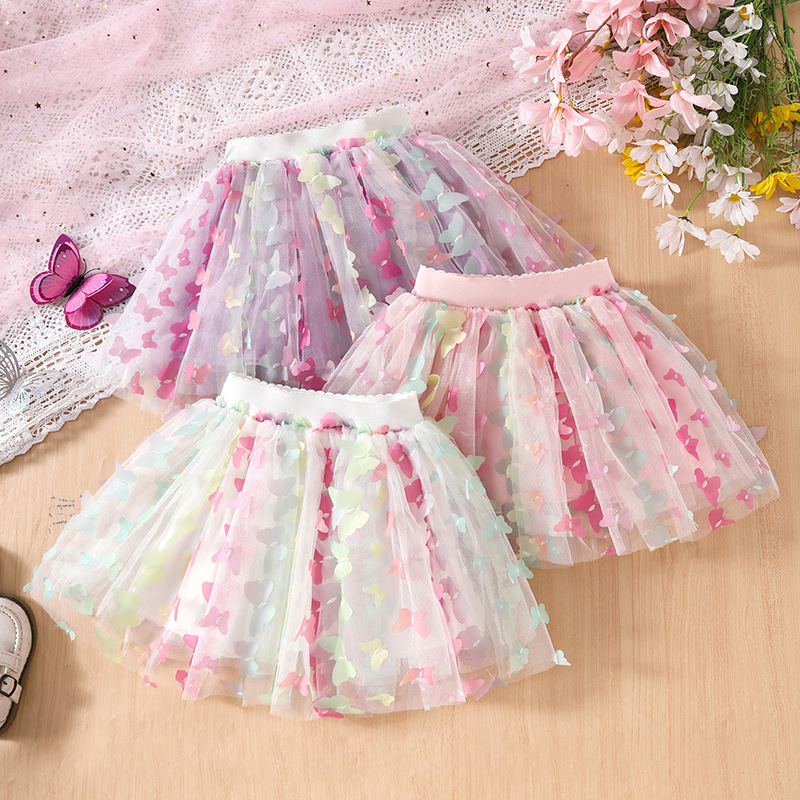 Ropa infantil al por mayor niñas coloridas mariposa tridimensional falda corta de verano falda de princesa de cuatro estaciones y media falda