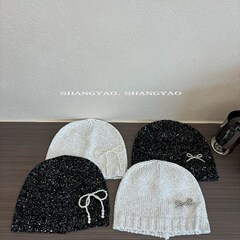 親子帽子の個性的な凹形のスターと同じスパンコールニットの頭の帽子の蝶結びの頭の子供の帽子の潮