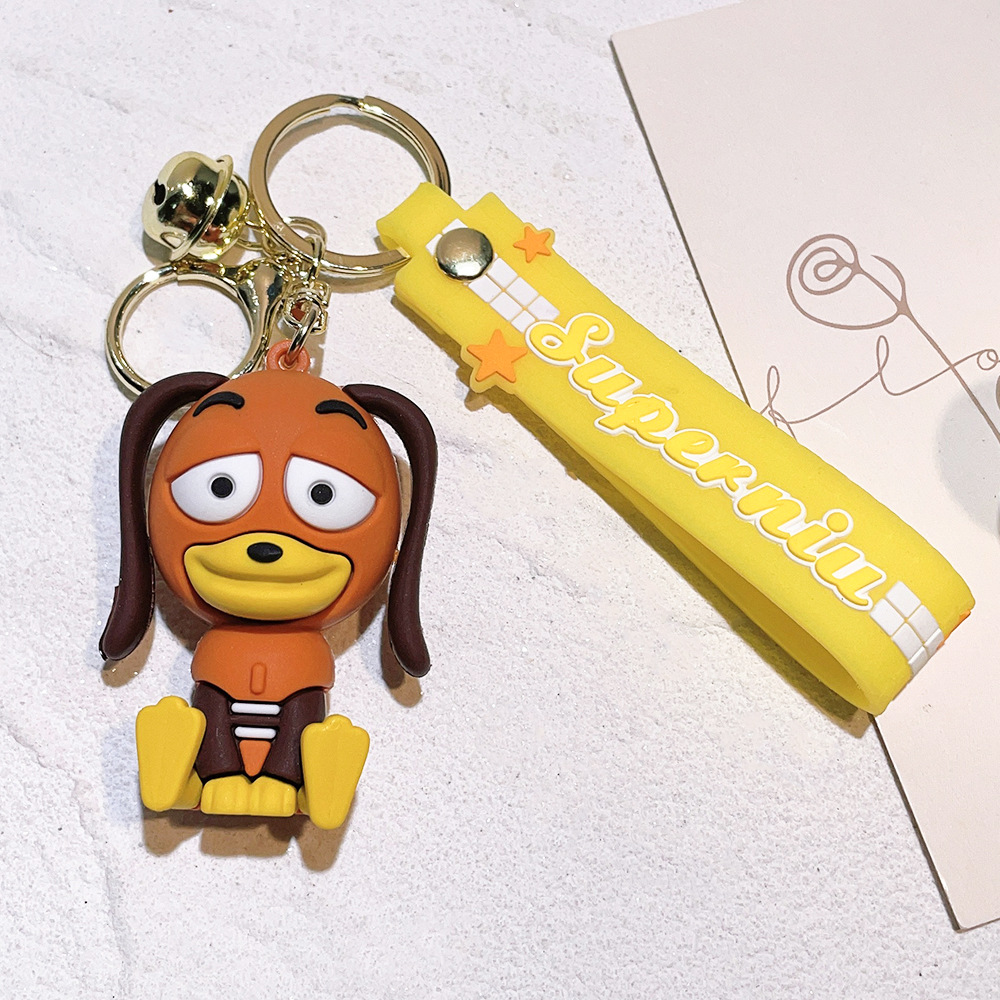 Llavero de silicona de Toy Story, el popular dibujo animado, con personajes como el alienígena de tres ojos, Buzz Lightyear y el oso Lotso, ideal como adorno para bolso.