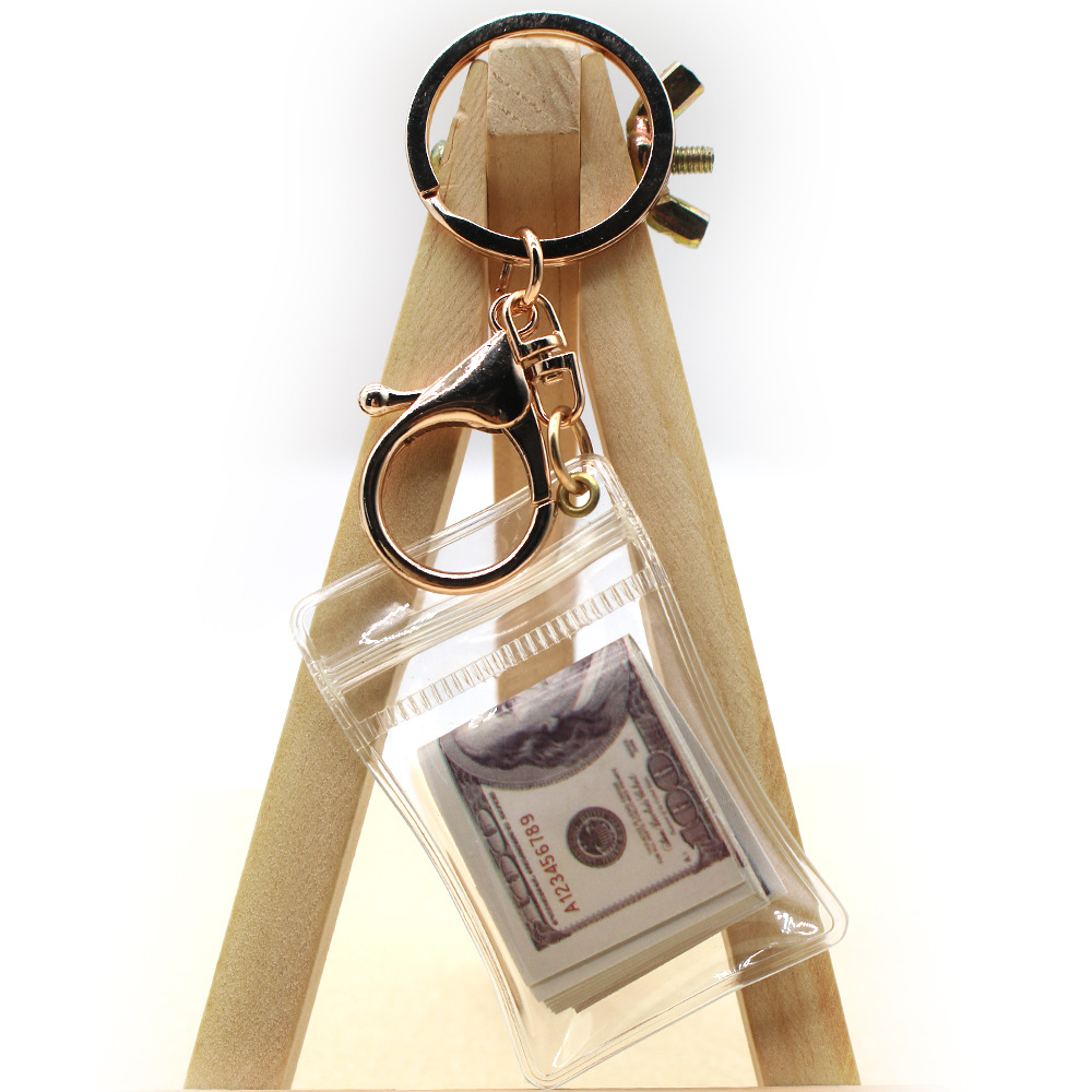 Simulación de dólar de Taiwán, dólar estadounidense, libra, won coreano, moneda indonesia, llavero, colgante de billetes de papel, medalla de oro, colgante de barra de oro, máquina de bebé