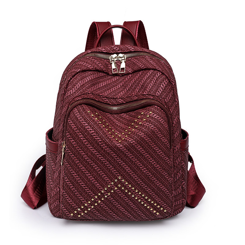 2023 primavera nueva mochila de cuero suave para mujer coreana moda urbana de gran capacidad remache mochila de viaje en nombre del cabello