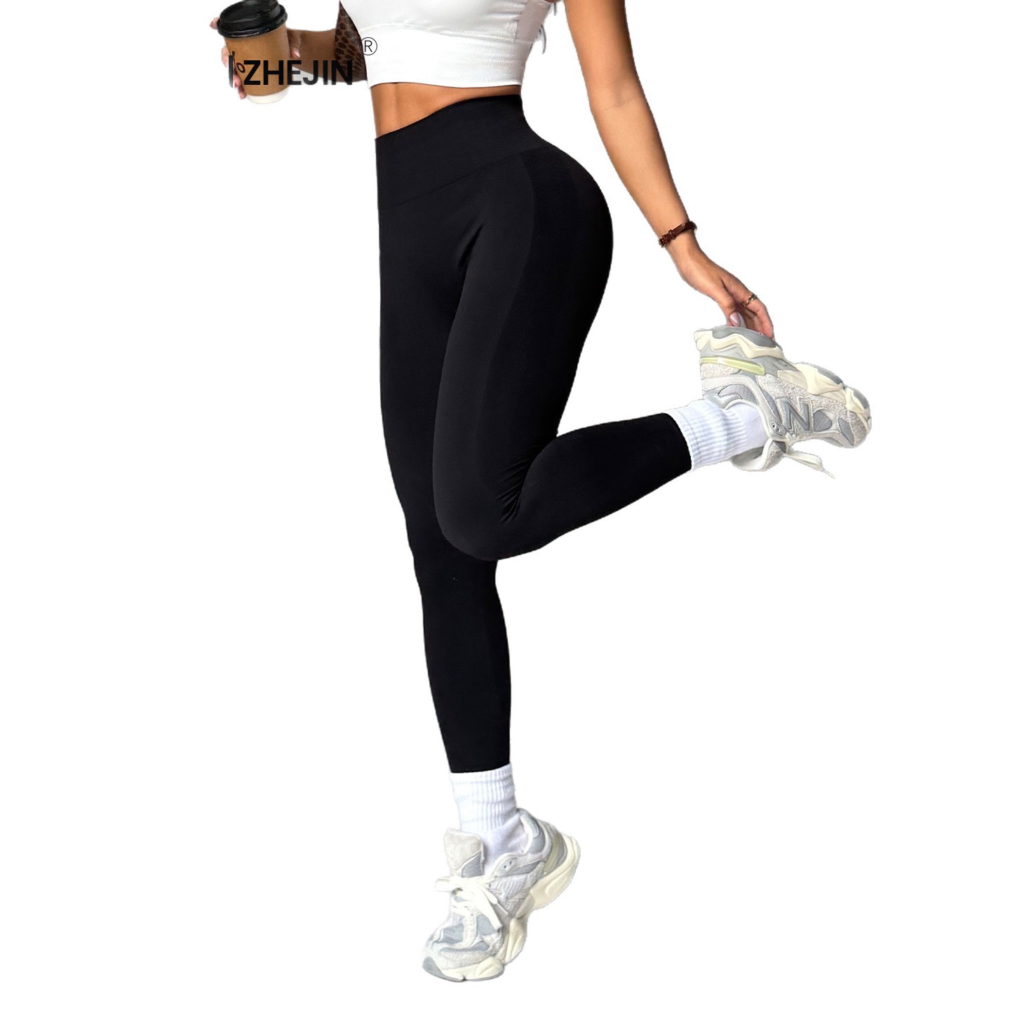 Europa y los Estados Unidos sin costuras cintura alta pantalon de gimnasio de alta cadera para mujeres corriendo al aire libre apertado nueve pantalones de pelusa de miel
