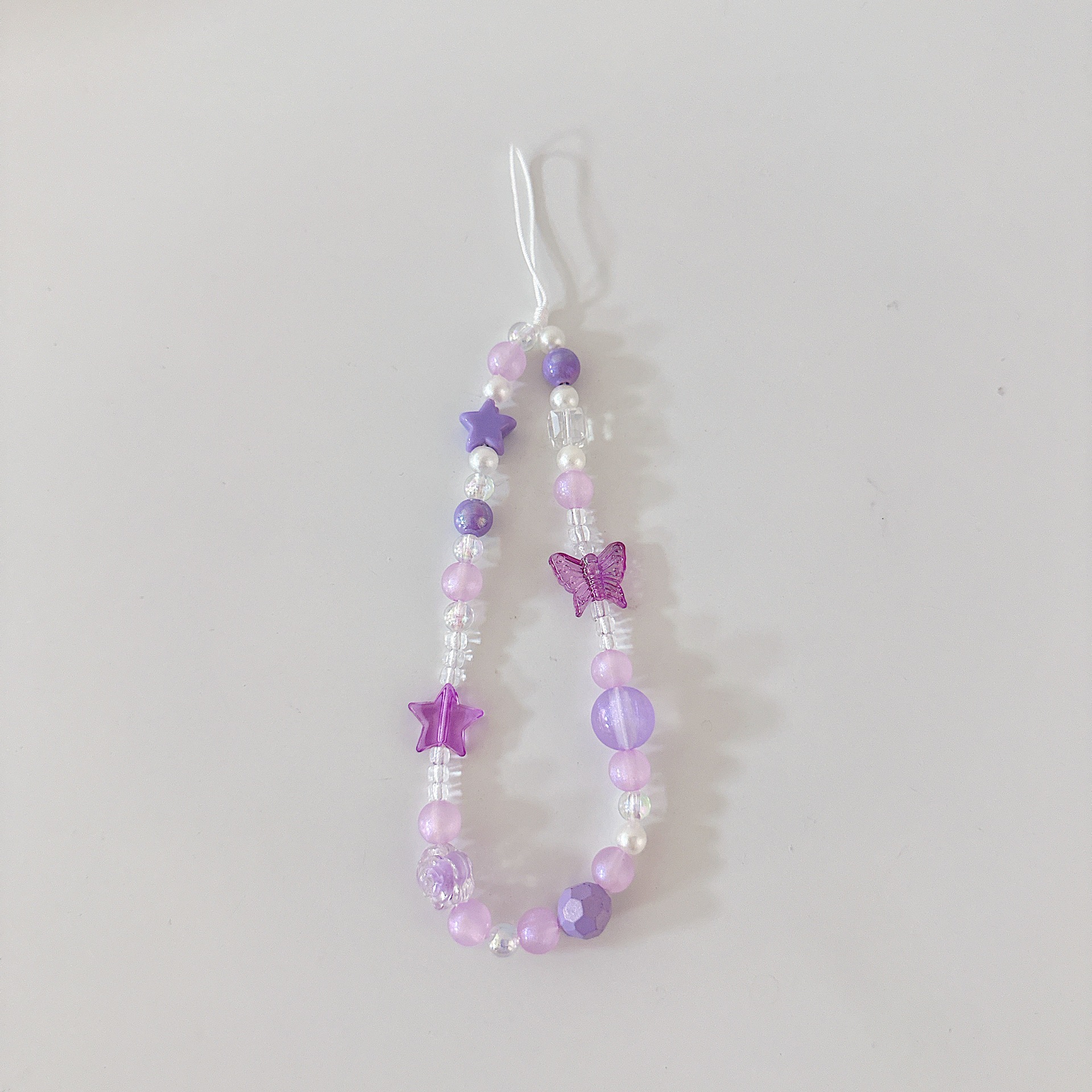 Cadena aplicable nicho mariposa corta cadena de muñeca arco cuentas de caso de teléfono móvil colgante tipo correa de muñeca anti-pérdida