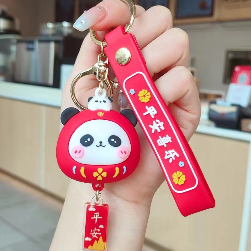 Muñeca de dibujos animados goteo llavero bolsas escolares exquisitas para hombres y mujeres colgantes para agarrar muñecas colgantes para el mercado nocturno regalos al por mayor